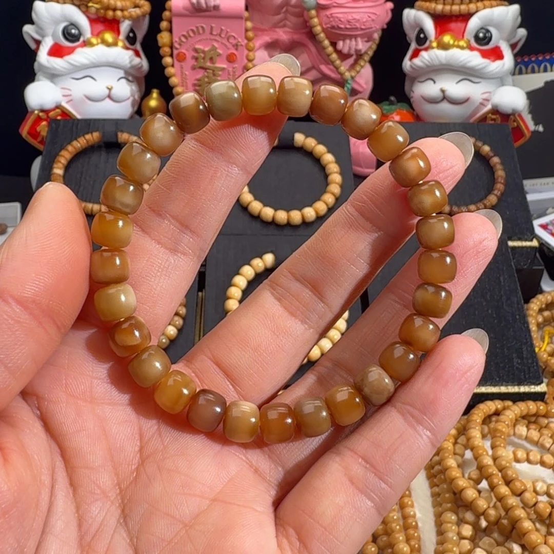 K***g龙脊菩提手串大地色玉化