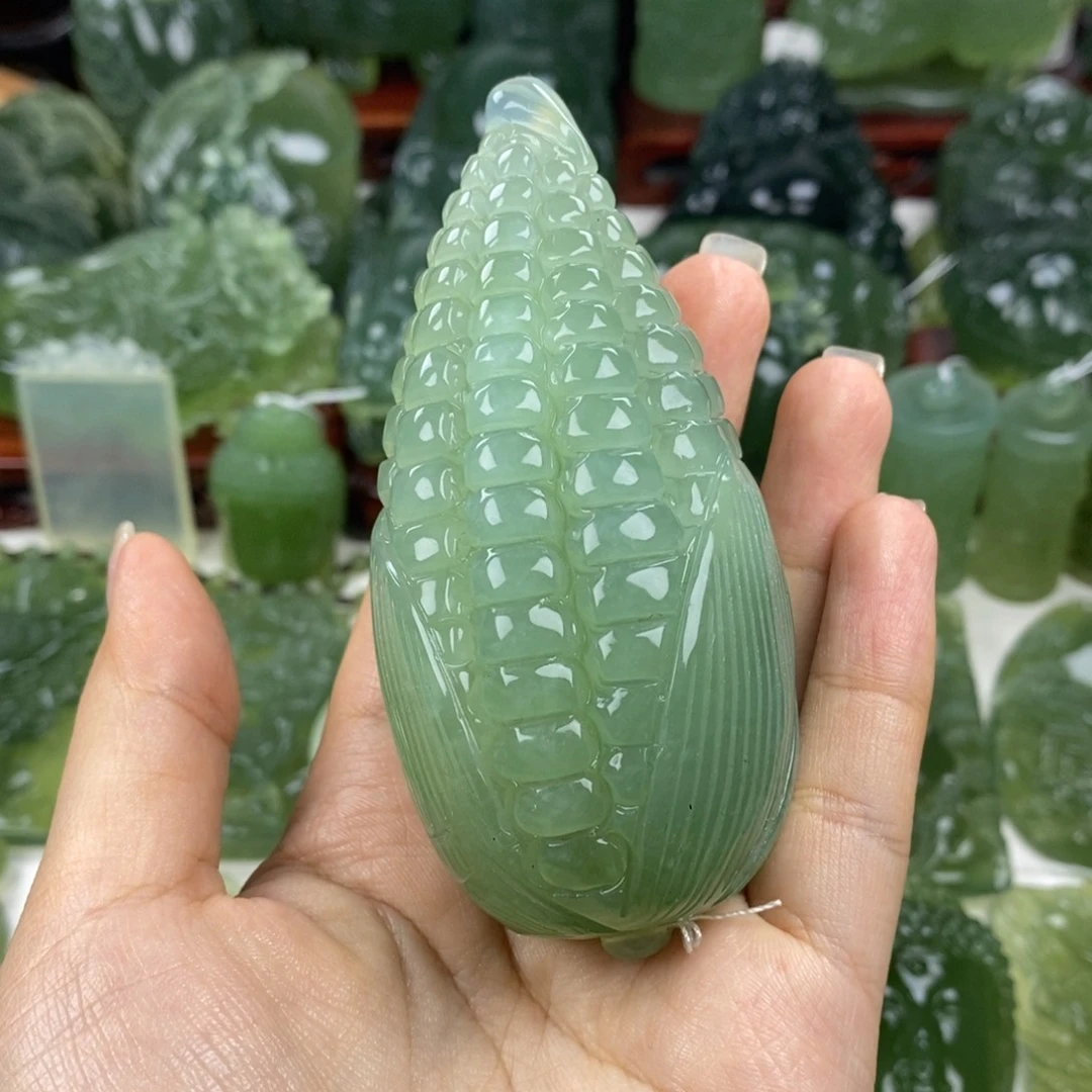 岫玉未镶嵌手把件回****天