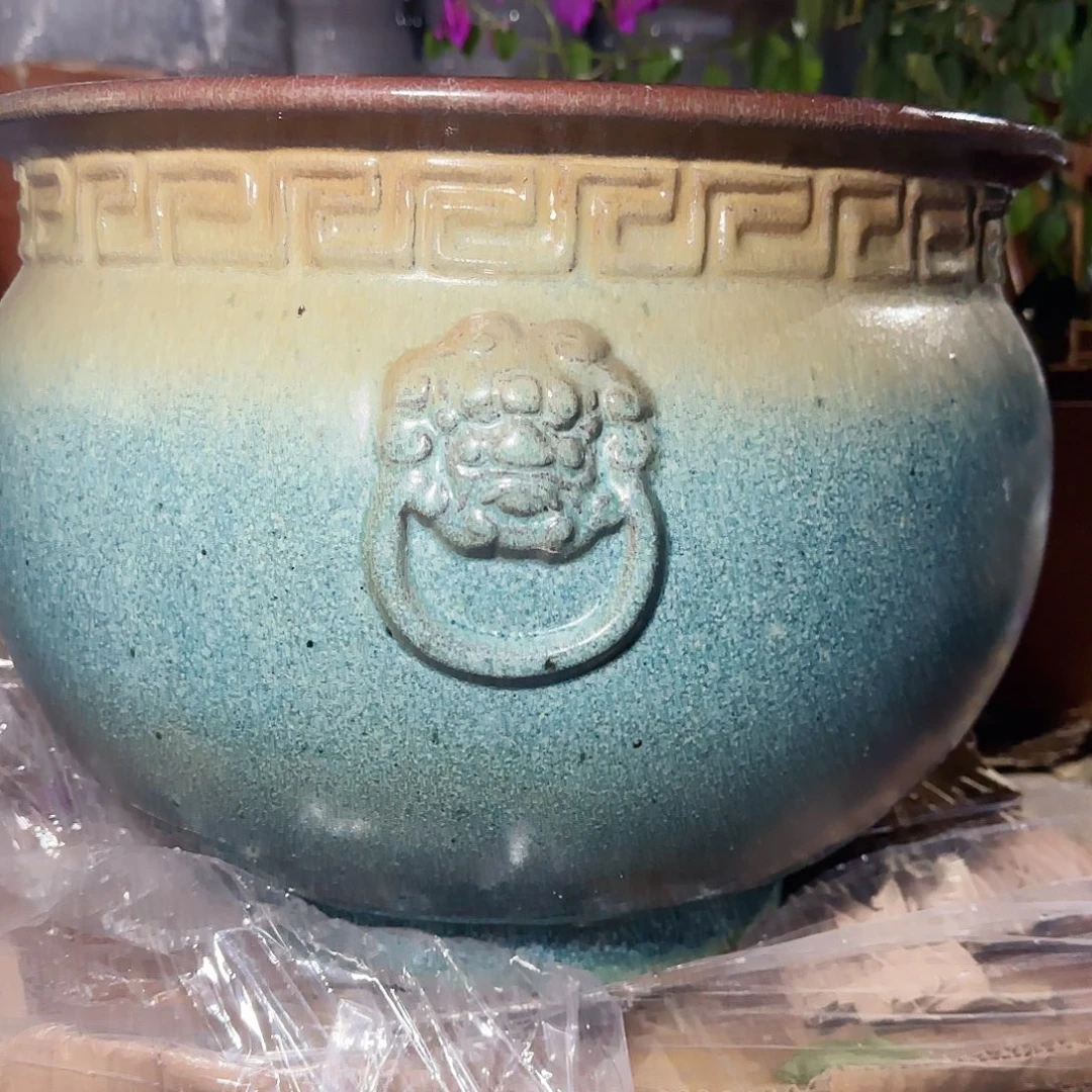 紫砂花盆高29口38。无孔