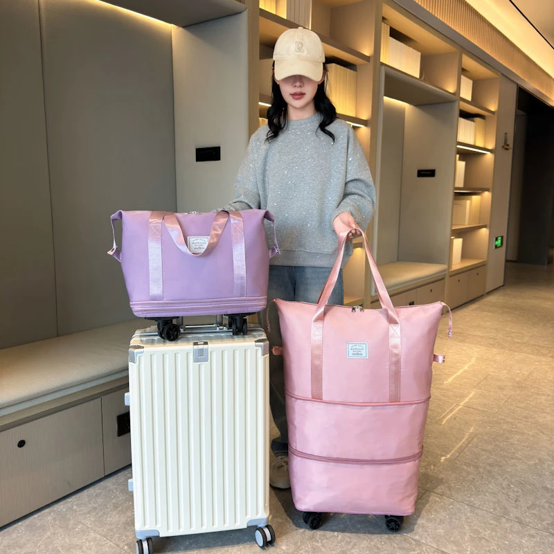 超大大容量旅行袋行李袋手提短途万向轮出差收纳旅行包待产滑轮