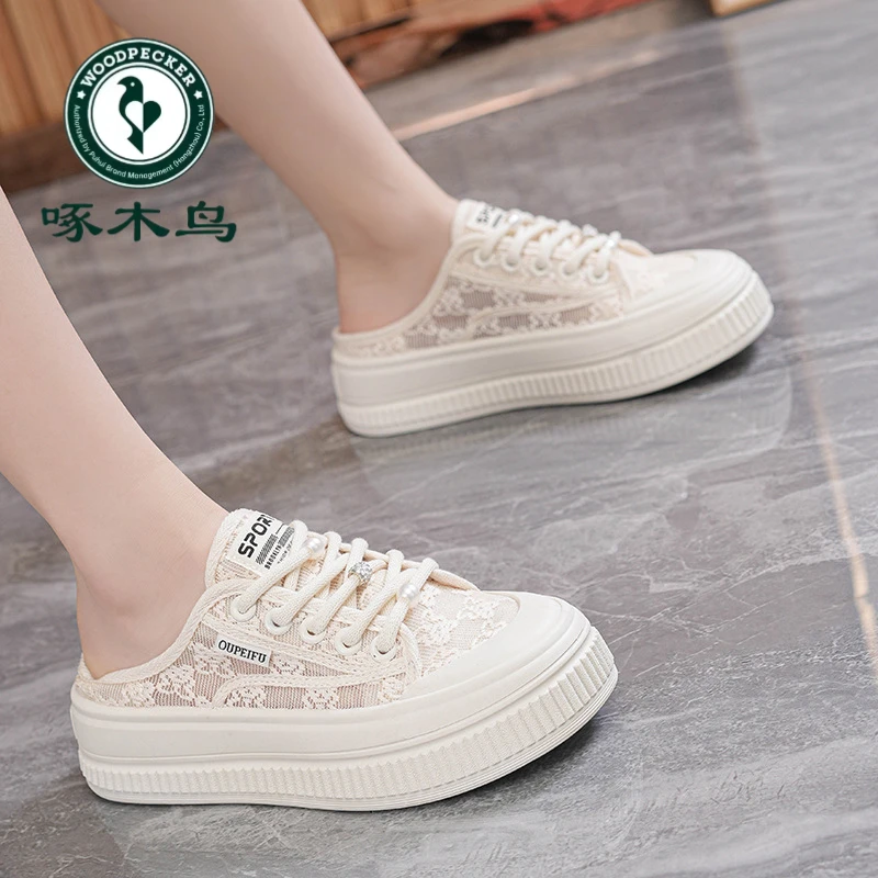 啄木鸟2025夏季新款韩版半托帆布鞋一脚蹬学生休闲鞋网红包头拖鞋