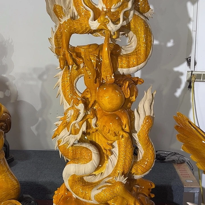 泽***雨香樟木双龙摆件……