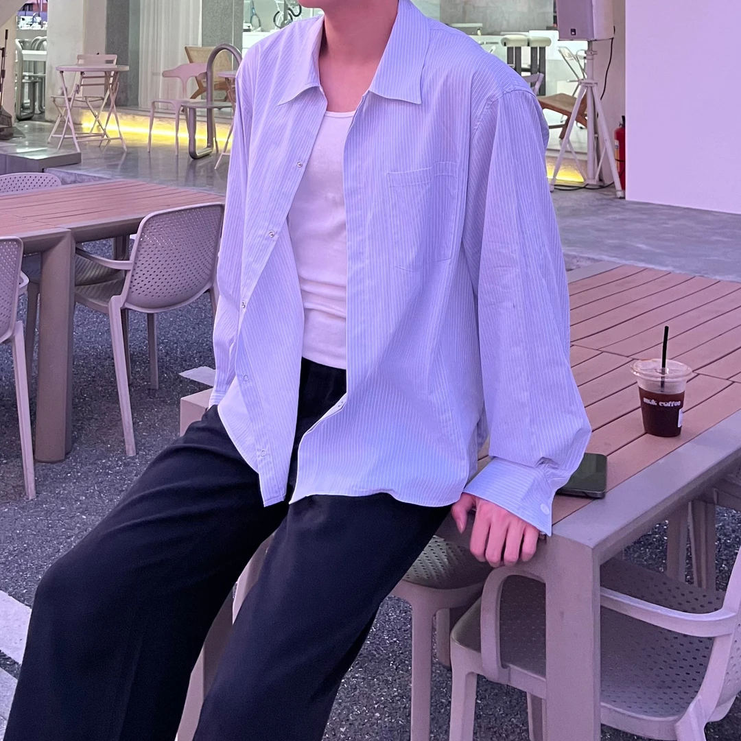 意卡伦萨2024SS早秋提花浅蓝条纹长袖夹克SM60938