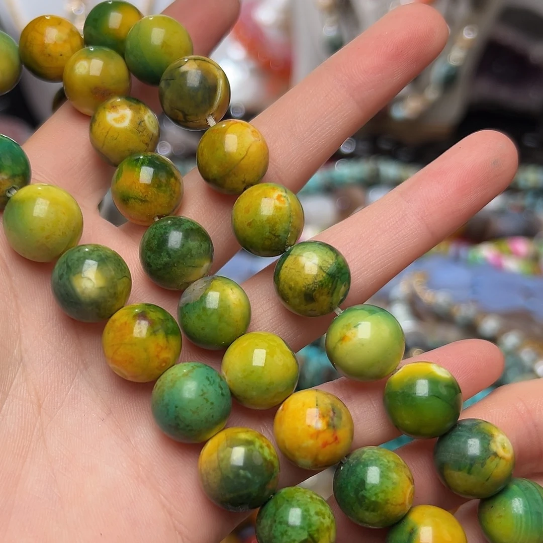 玛瑙/玉髓合金珠宝半成品C528。14mm孔雀绿原矿松石圆珠一条