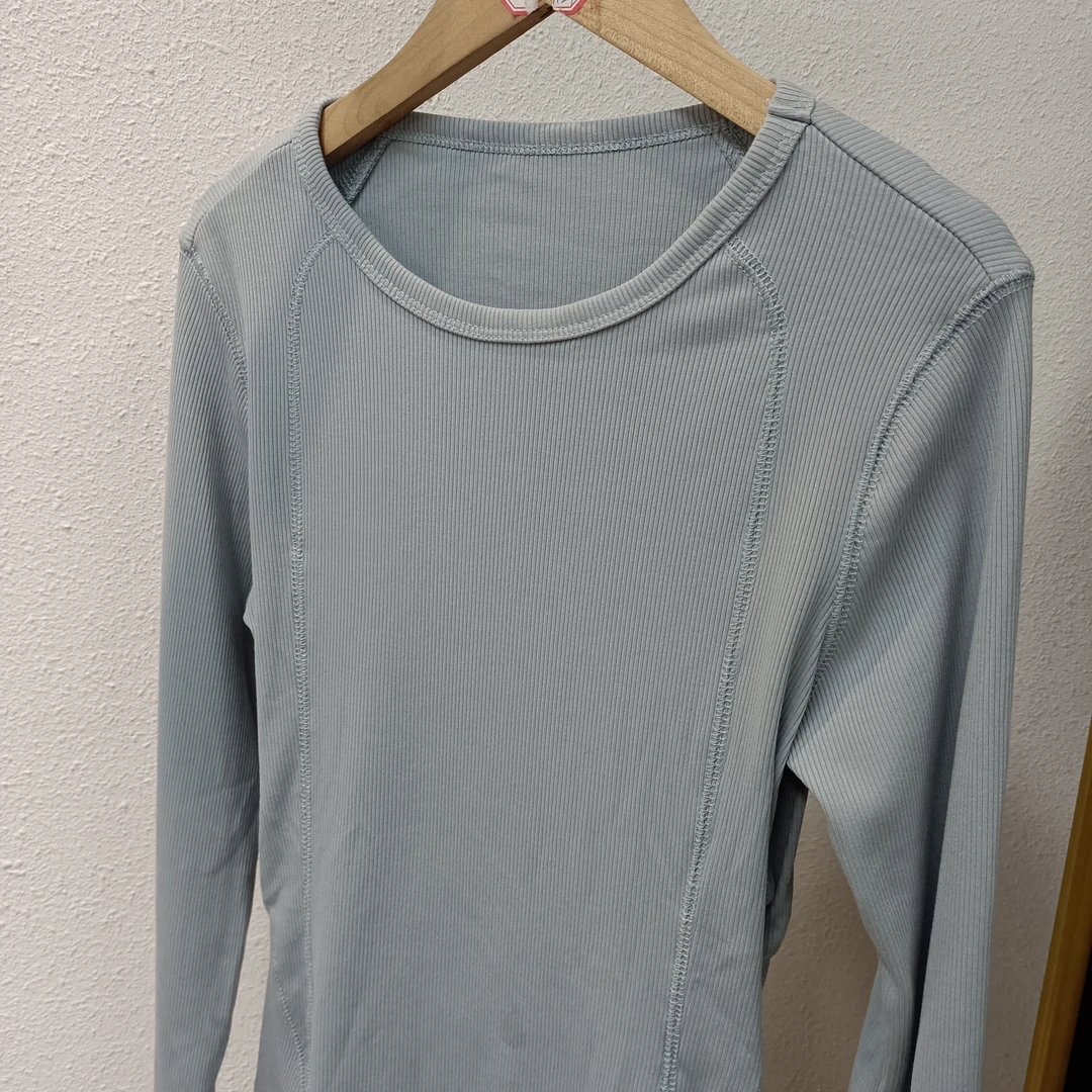 唯琳剪标   3仓P1-1-3409款   浅蓝色长袖圆领上衣