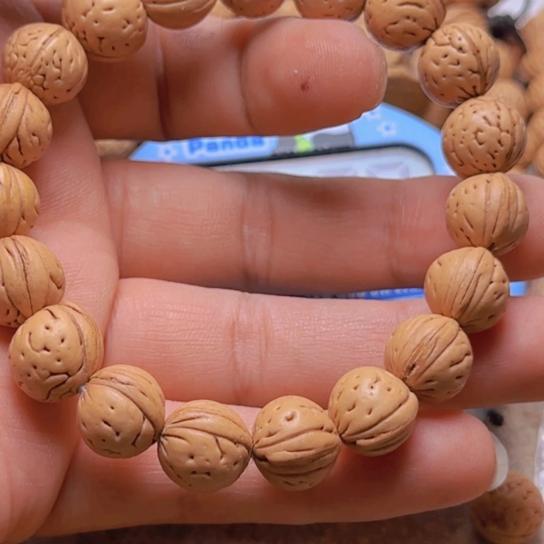 道**然拍65野生桃核黄桃手串一条
