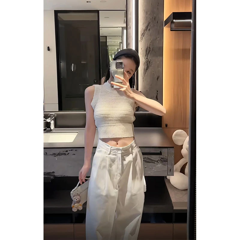 2025年夏季新款白色半高领无袖针织背心女纯欲上衣配高腰显瘦长裤