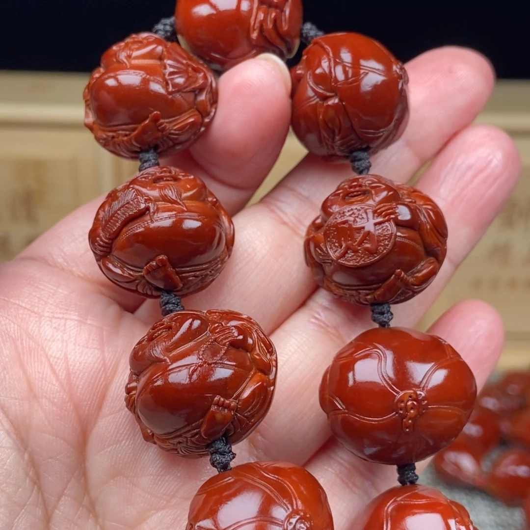 ：****橄榄核吊坠财神23