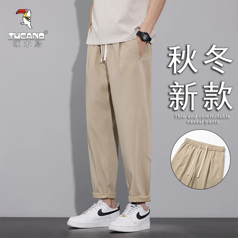 啄木鸟军绿色裤子男九分裤春秋休闲裤2025新款工装裤百搭舒适西裤