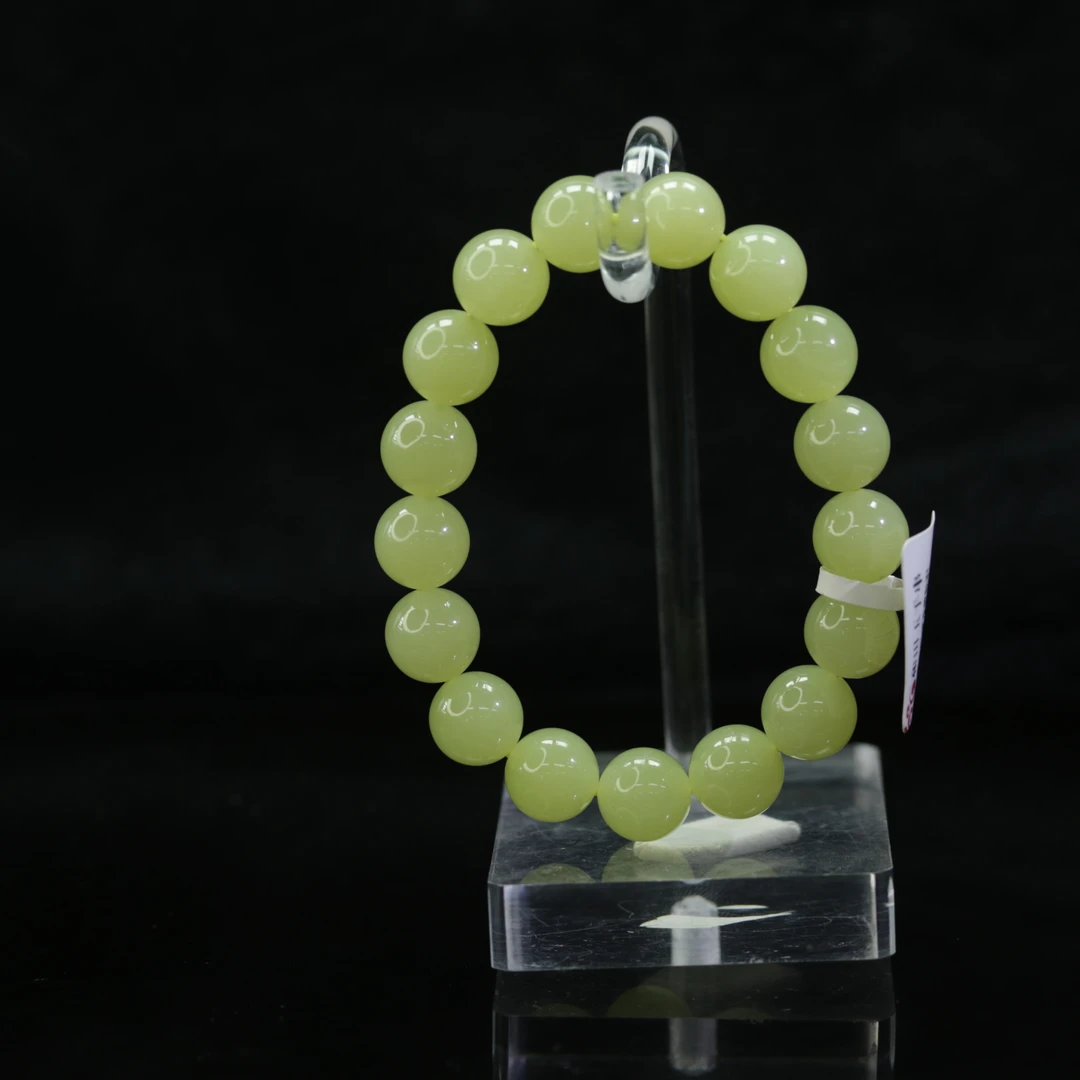 39和田玉若羌黄口手串/100394保利厦门拍卖