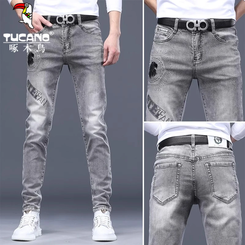 啄木鸟秋冬新款灰色牛仔裤男士弹力潮流修身小脚个性印花休闲长裤