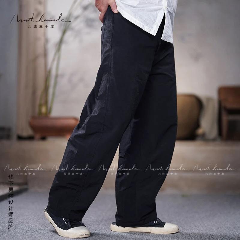 北纬三十度男士阔版弯刀微皱轻盈保暖百搭90白鸭绒轻薄羽绒裤机洗