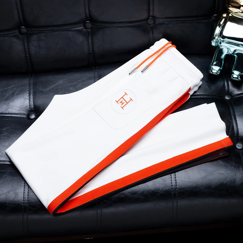 高端欧货夏季薄款白色冰感休闲裤男士潮流撞色织带修身运动卫裤潮