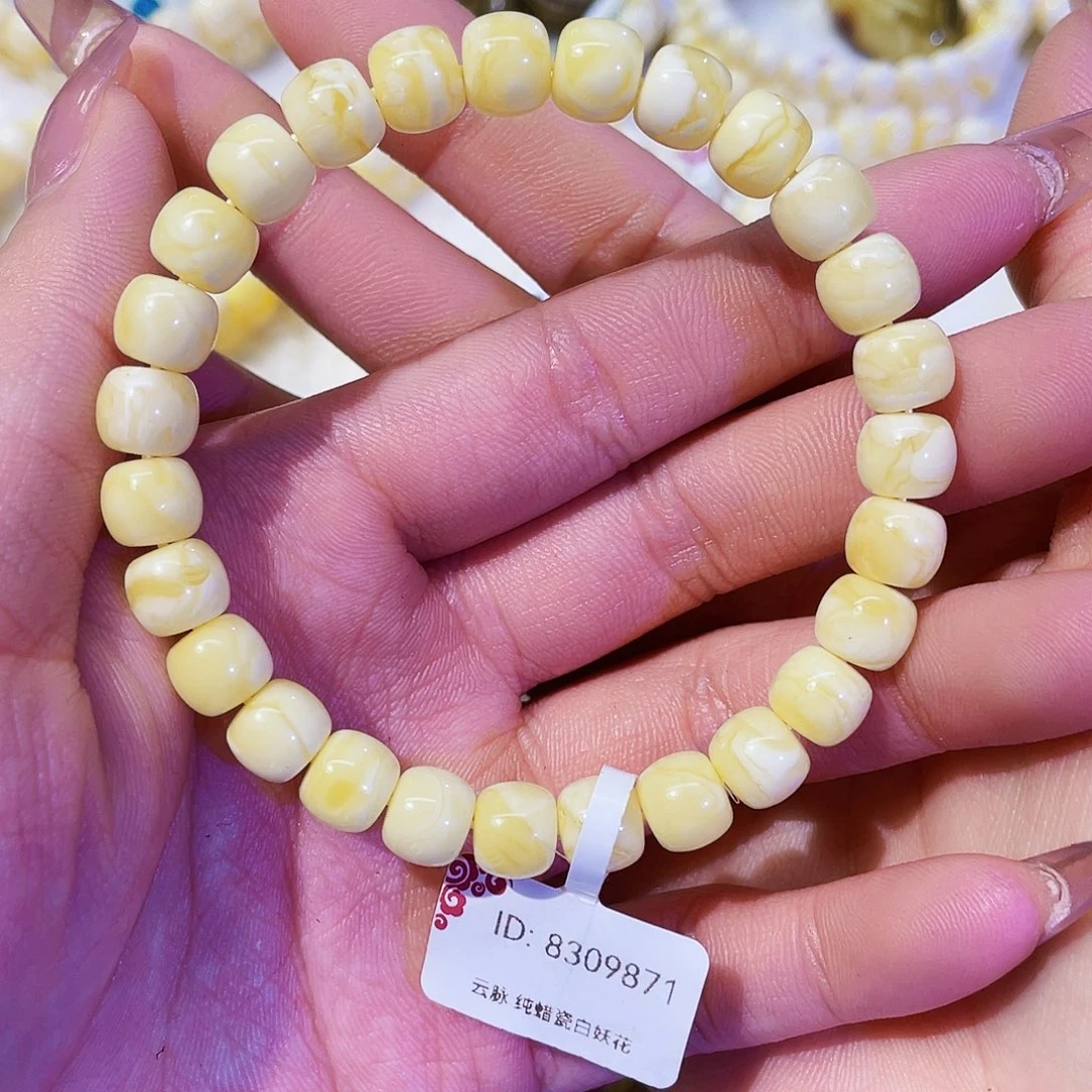 蜜蜡未镶嵌手串8.3mm 瓷白纯蜡橘底细纹溶洞妖花