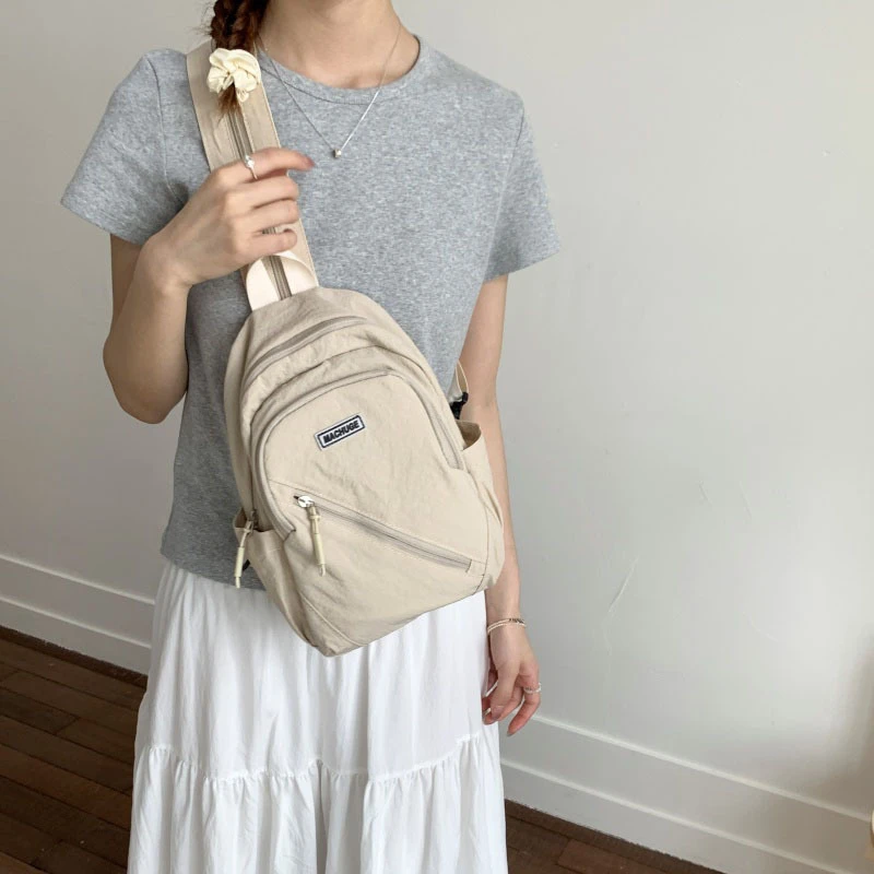 户外款男女新款简约休闲双肩包女小背包运动健身胸包百搭通勤挎包
