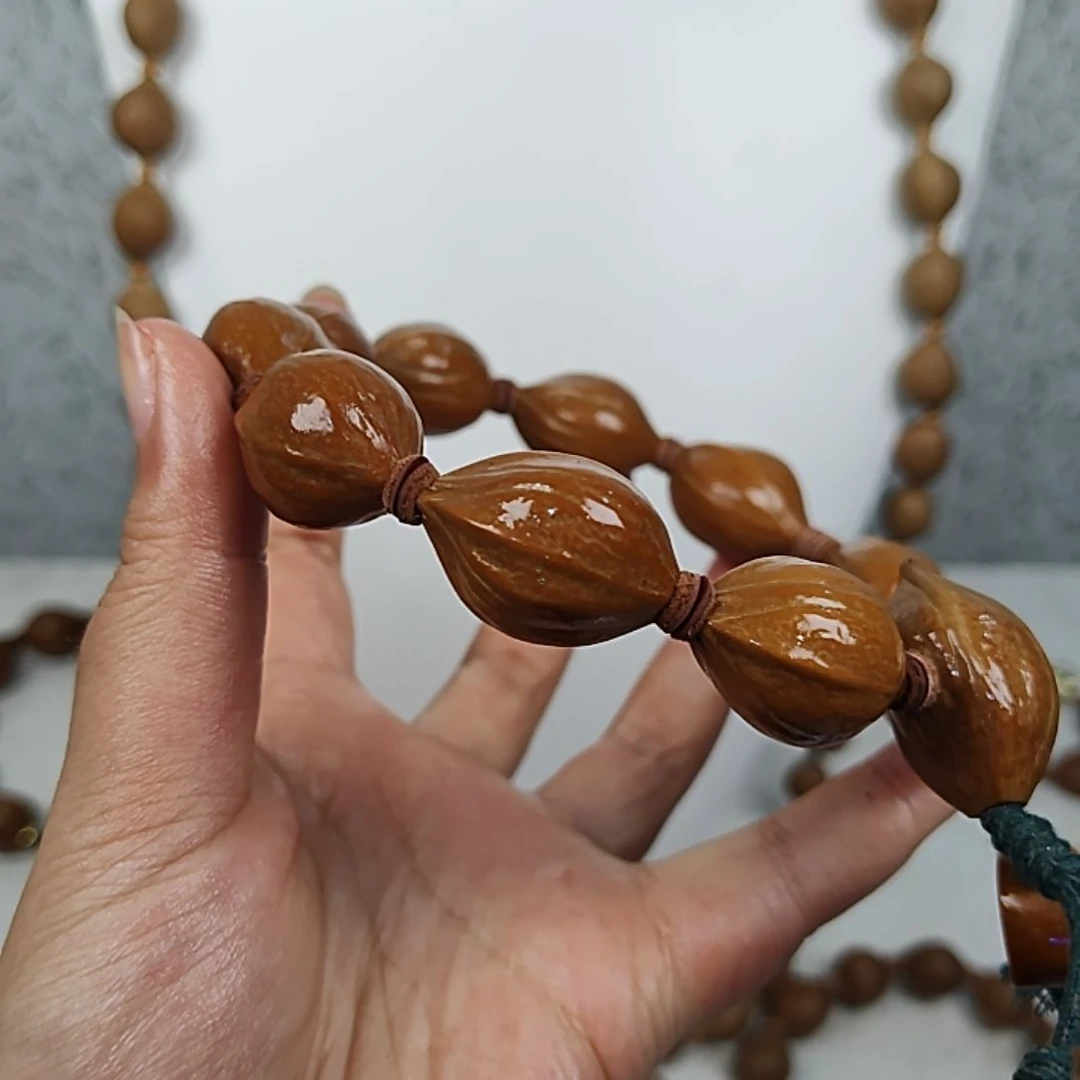 吊坠橄榄核1825尺寸三面佛直心料去霜全品