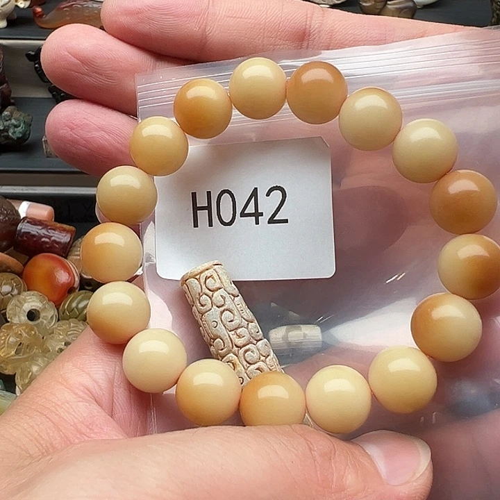 撷***来手串菩提根/象牙果