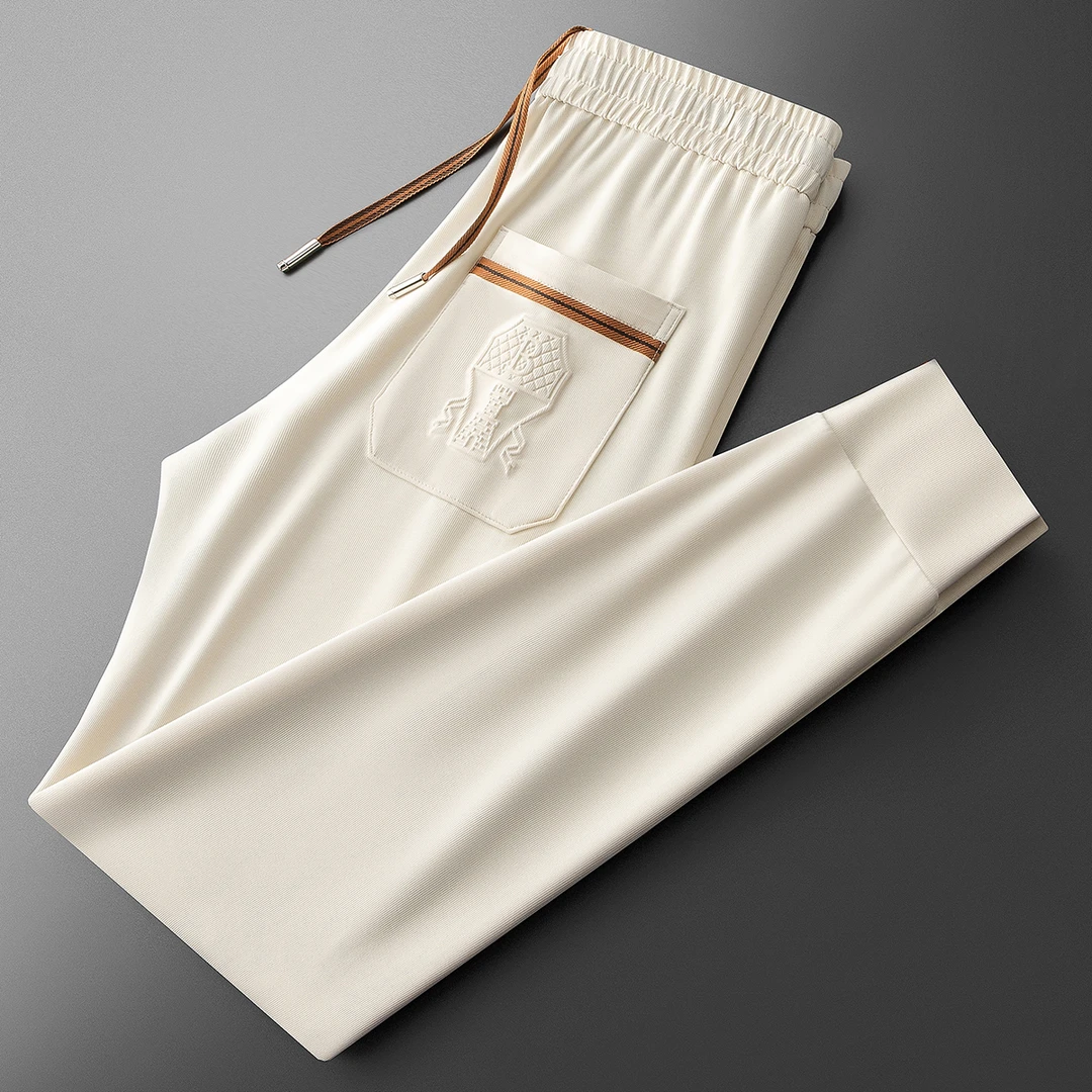 NDSL夏季高端轻奢时尚潮流冰丝裤子立体压胶修身小脚运动休闲裤