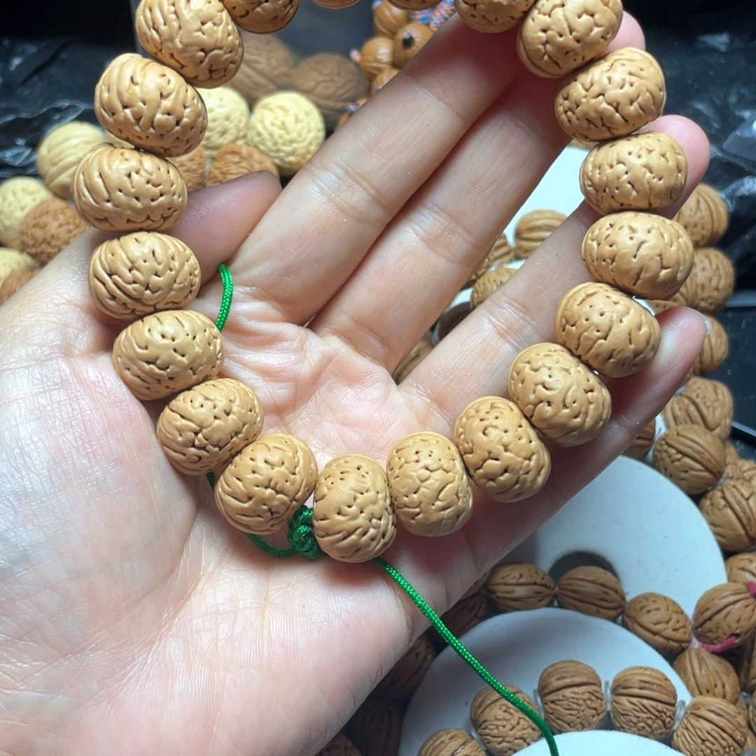 桃核吊坠桃核手串18+钮扣