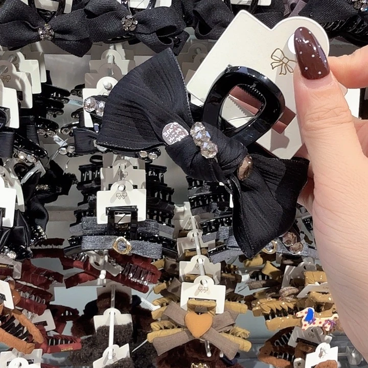 三个钻蝴蝶结抓夹