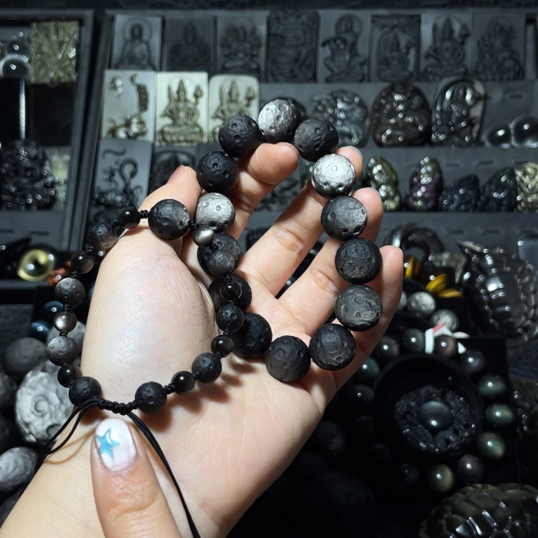 摇***滚黑曜岩未镶嵌珠宝奇石