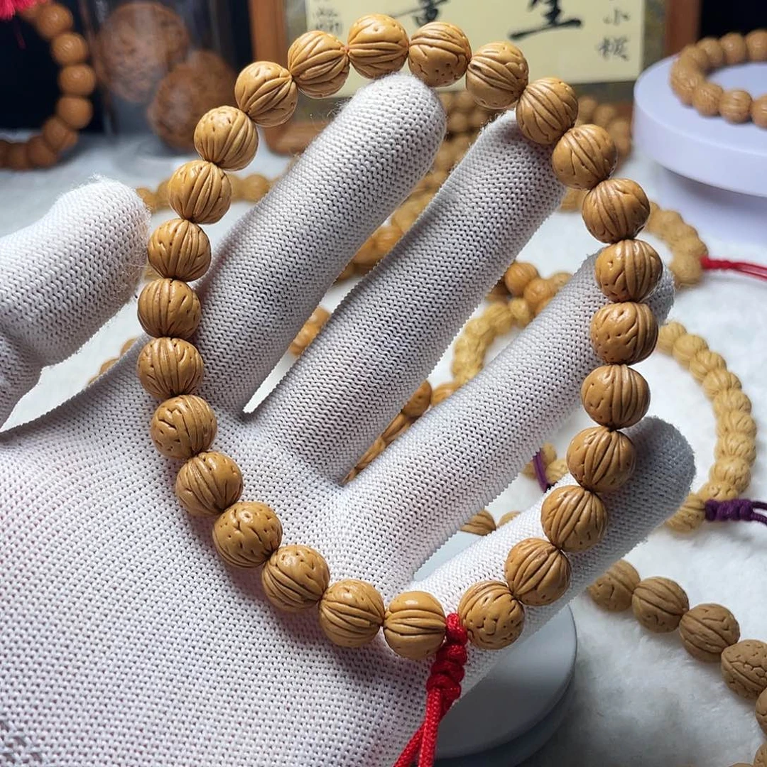 ζ***°核桃木/黑胡桃（胡桃木）11野生桃核手持