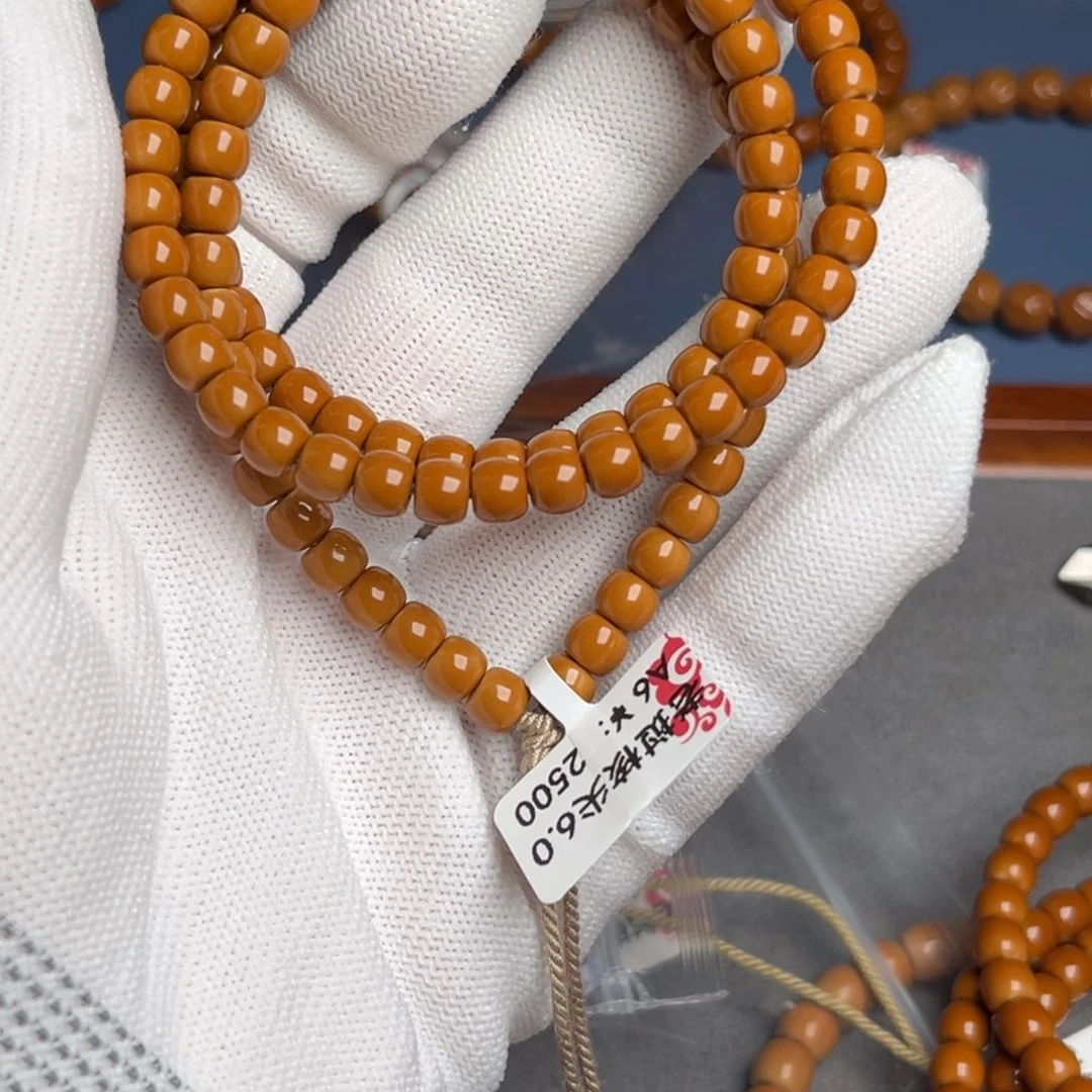 嗨***P橄榄核吊坠6.0A6核尖