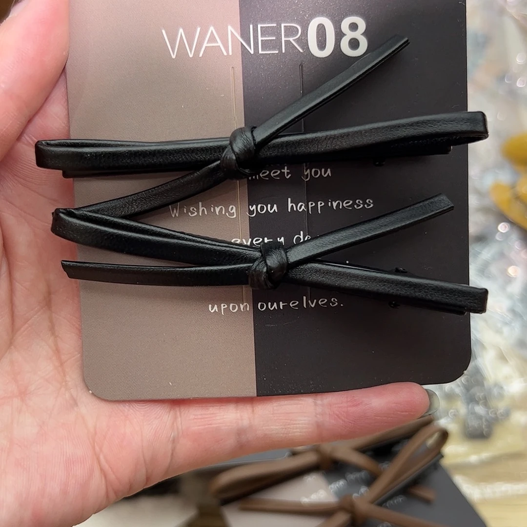 布艺非金属灰色蝴蝶结压夹