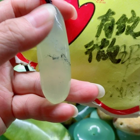未镶嵌蛇纹石玉手把件