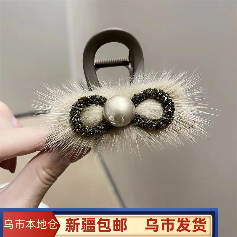 新疆包邮韩版蝴蝶结毛毛抓夹女后脑勺盘发鲨鱼夹发夹水貂毛头饰