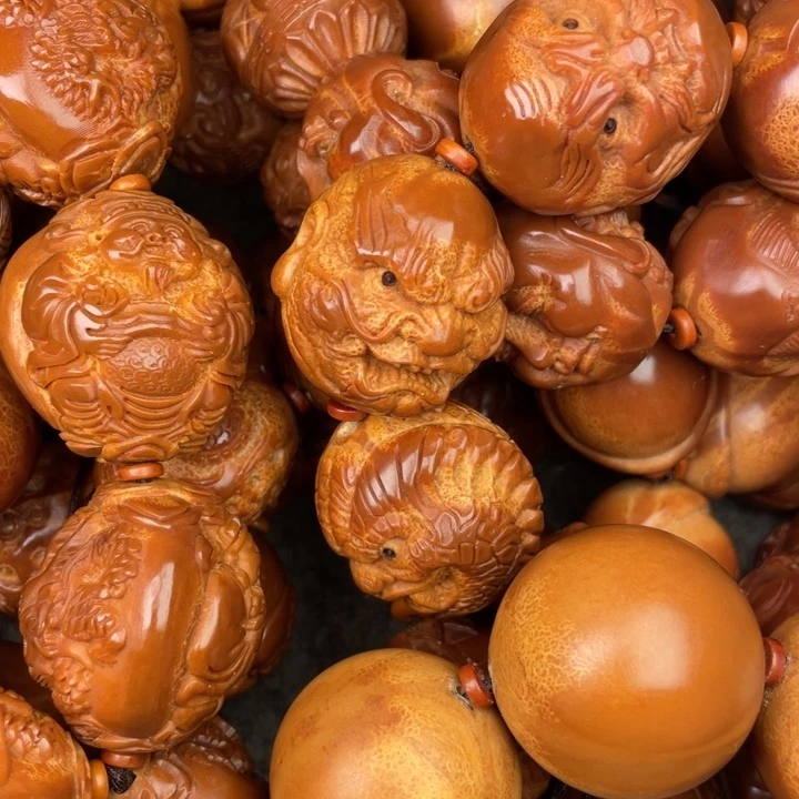 文玩核桃吊坠橄榄核