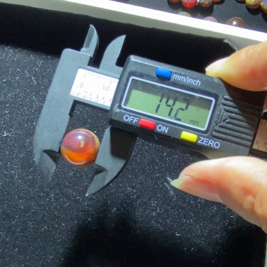常***佛未镶嵌琥珀裸石根蜜溶洞单珠14.2 m m打1.5孔
