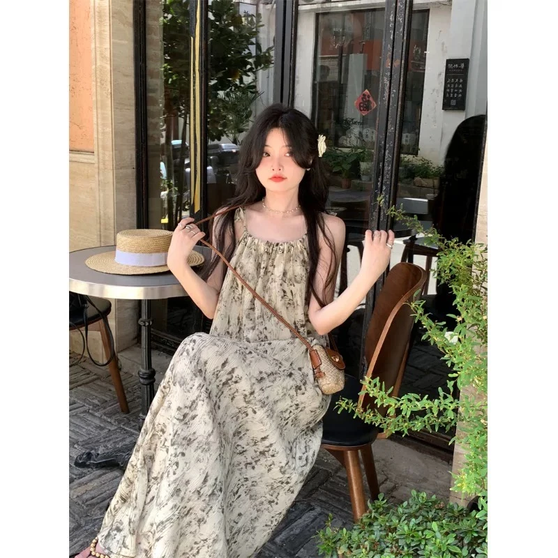 【恋爱来信】夏季新款韩版气质减龄绑带碎花设计感宽松长款吊带长裙