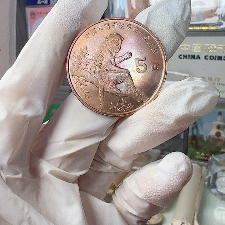 其他普通金属金丝猴镜面自然五彩单枚，