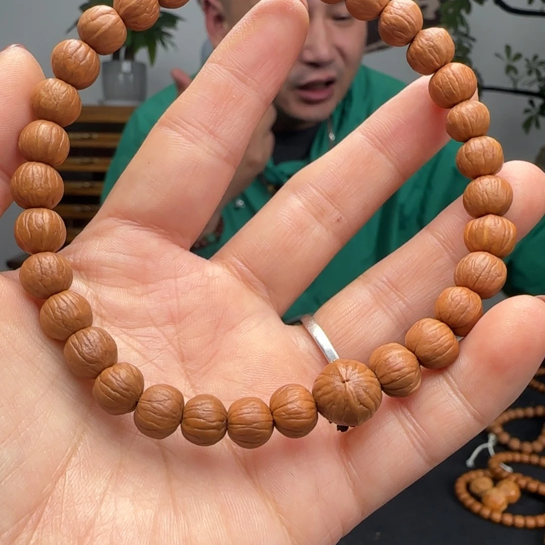 梁***辰猴头核桃手串双歧