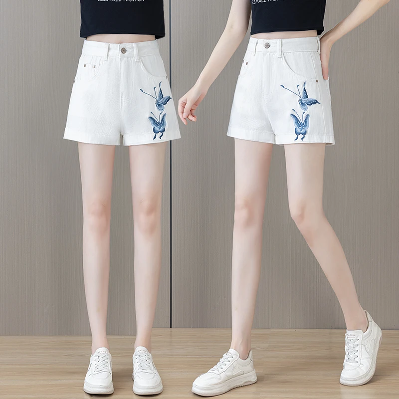 潮流蝴蝶刺绣设计牛仔夏装休闲白色短裤女士高腰a字热裤阔腿时尚