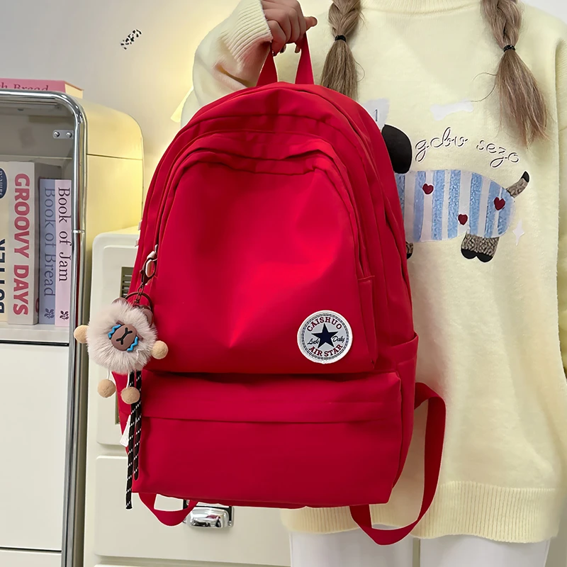 新款大容量日系韩版学生书包斜挎包双肩包初中生高中生休闲轻便