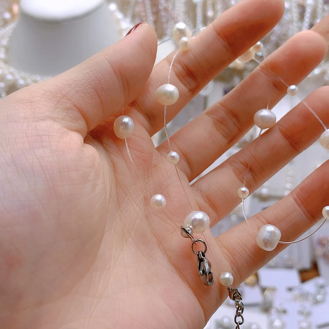 银S925镶嵌耳饰淡水珍珠圆***肉