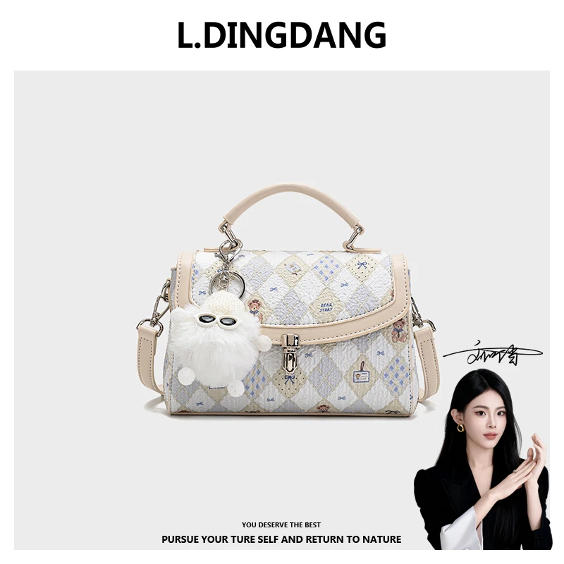 【刘叮当甄选】子弹头锁扣手提包斜挎单肩大容量多隔层女挎包23278