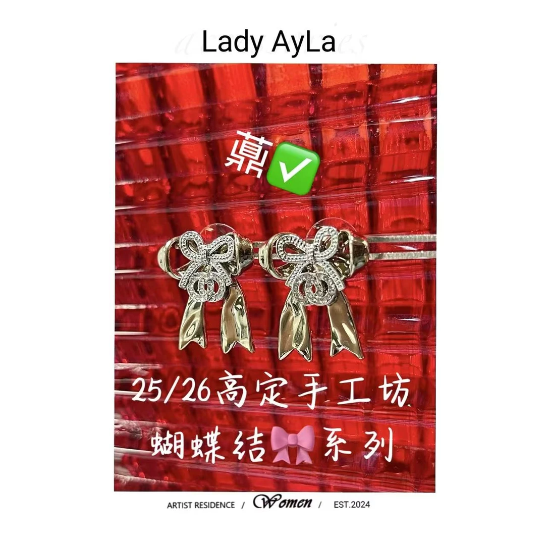 925银合成锆石耳饰 25S C 蝴蝶结 银耳钉AL382