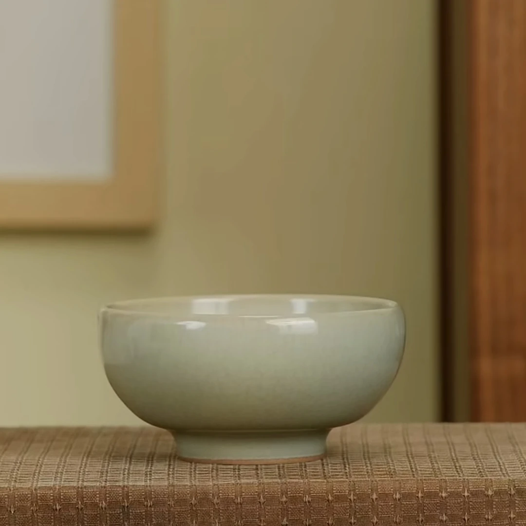 米黄厚釉厚胎宽口普洱杯