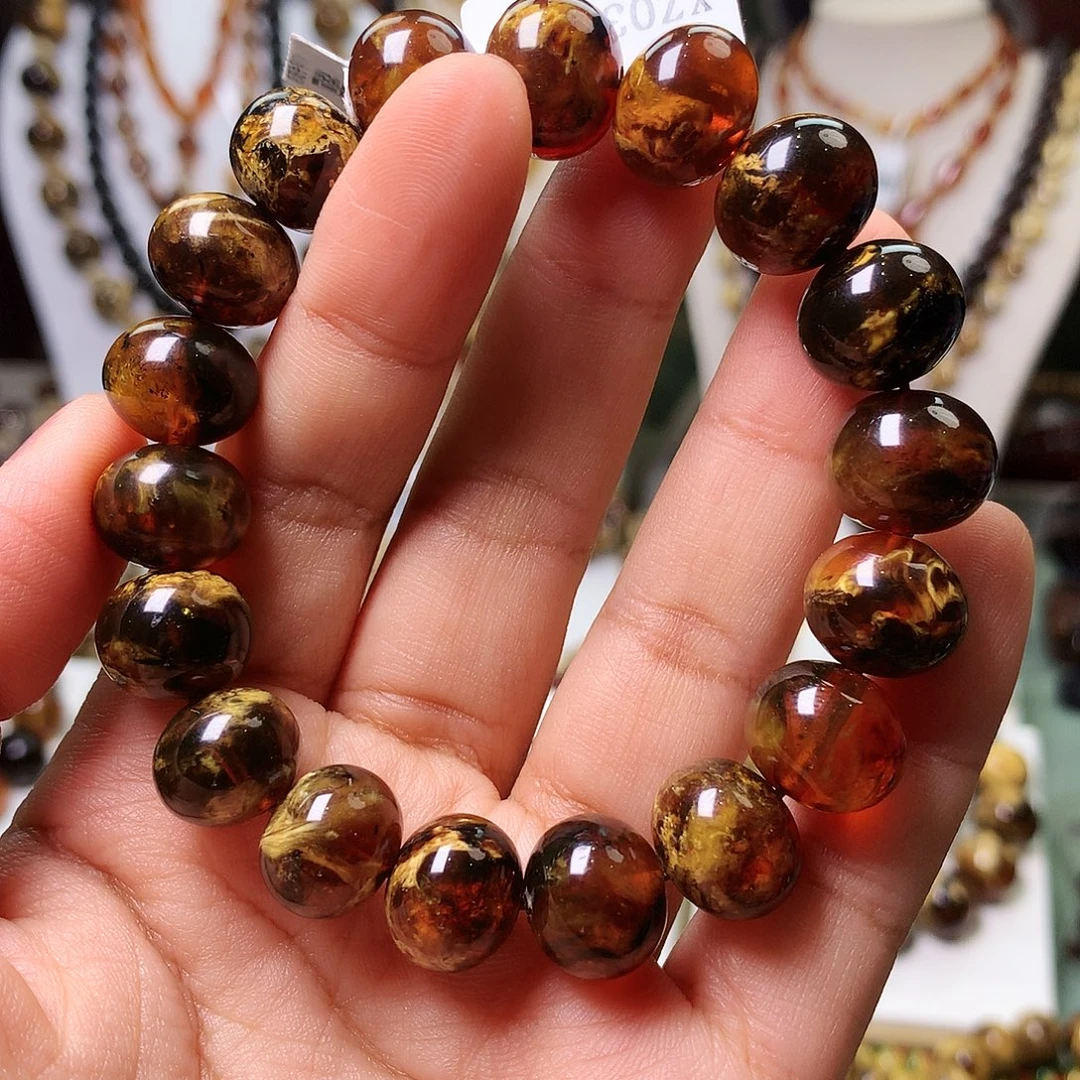 飞***鸟琥珀未镶嵌裸石抚顺琥珀