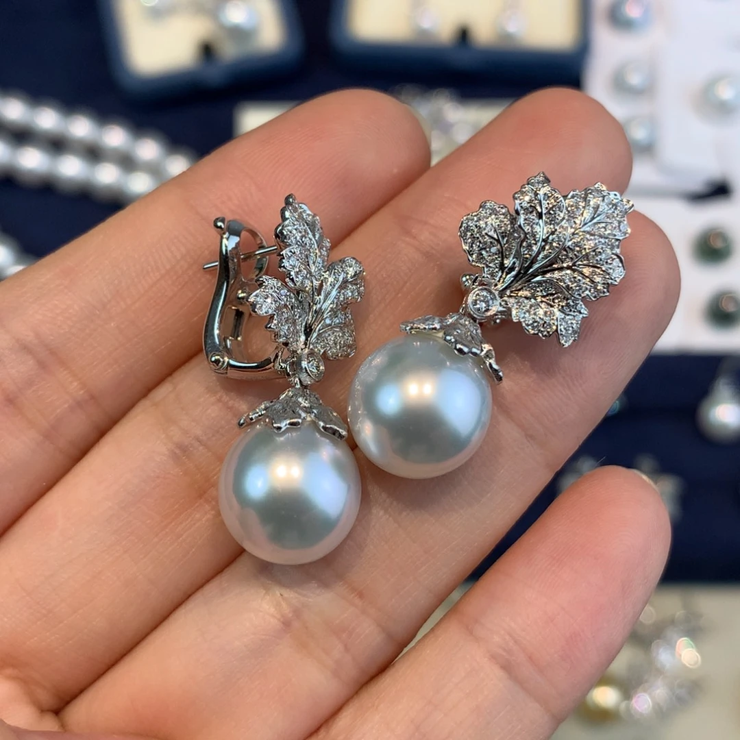 小***子18K金镶嵌耳饰海水珍珠11-12mm 尾款