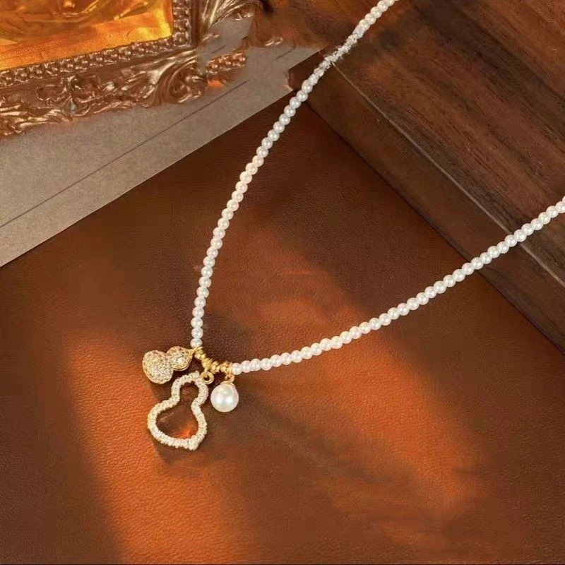 钛钢项链 2010精致甜美葫芦项链