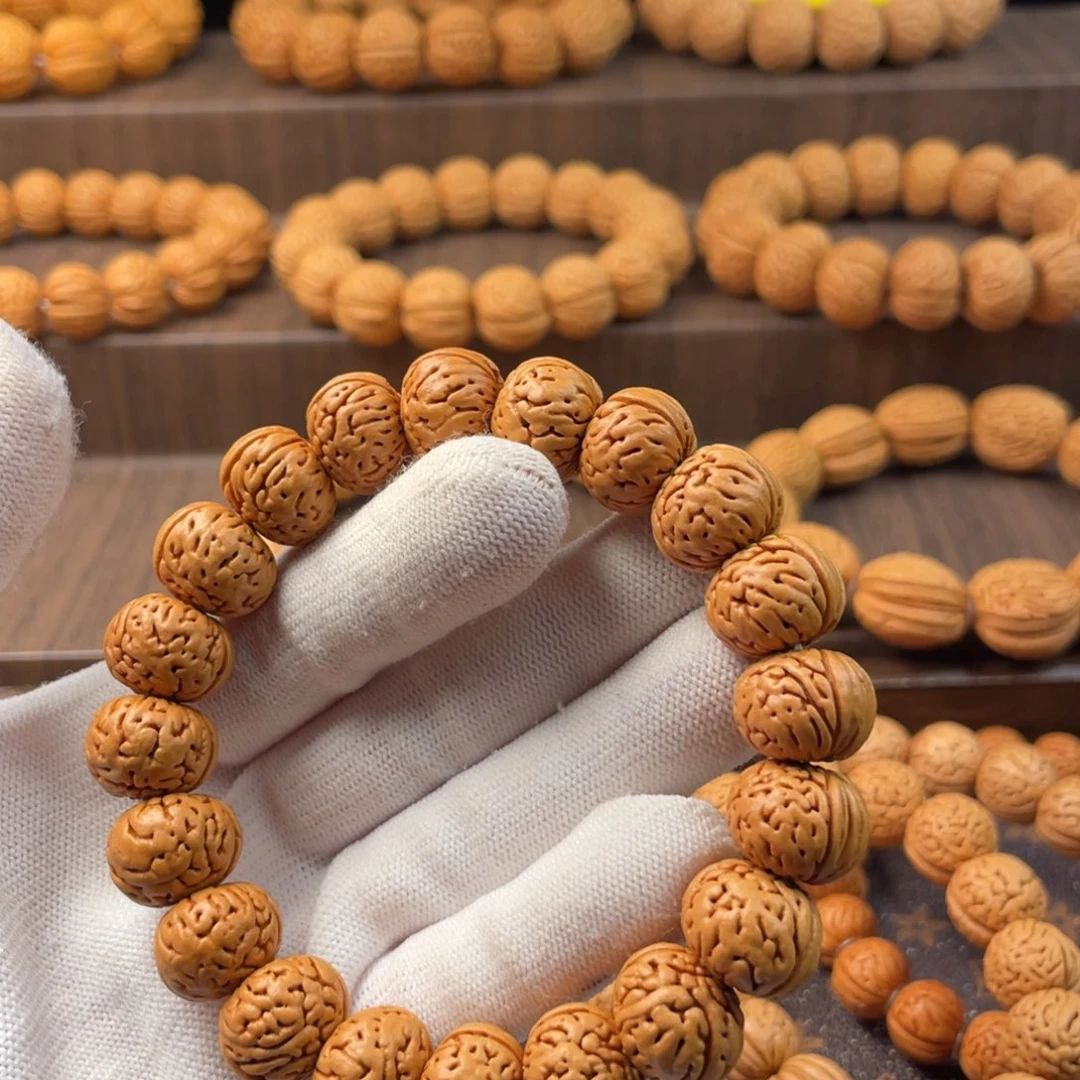 安***.桃核吊坠树王纽扣