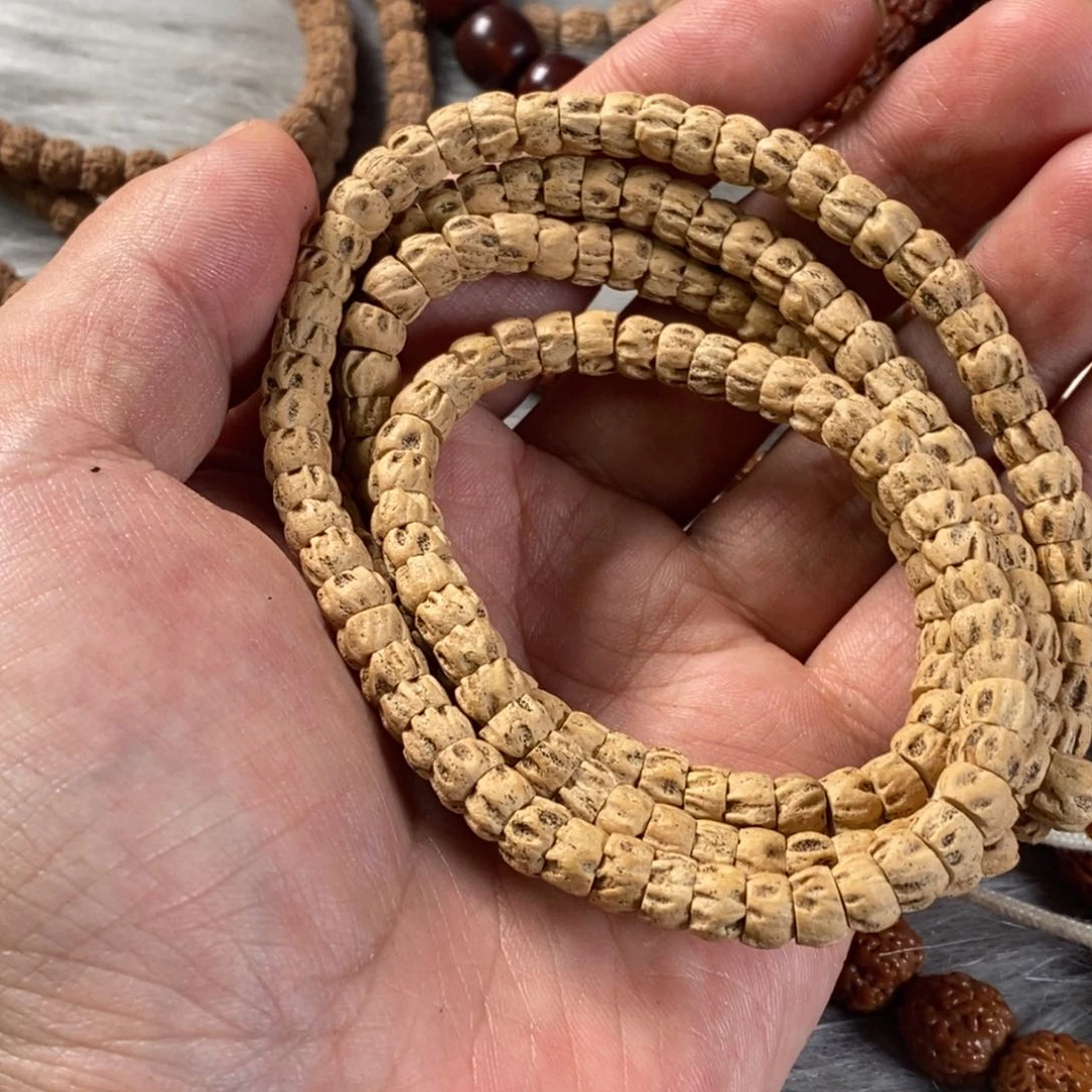 V***.柏香籽/百香籽吊坠百香大肠热振鬼脸