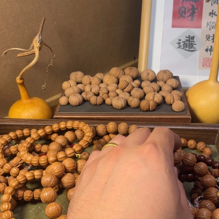 吊坠桃核猴头核桃凤羽