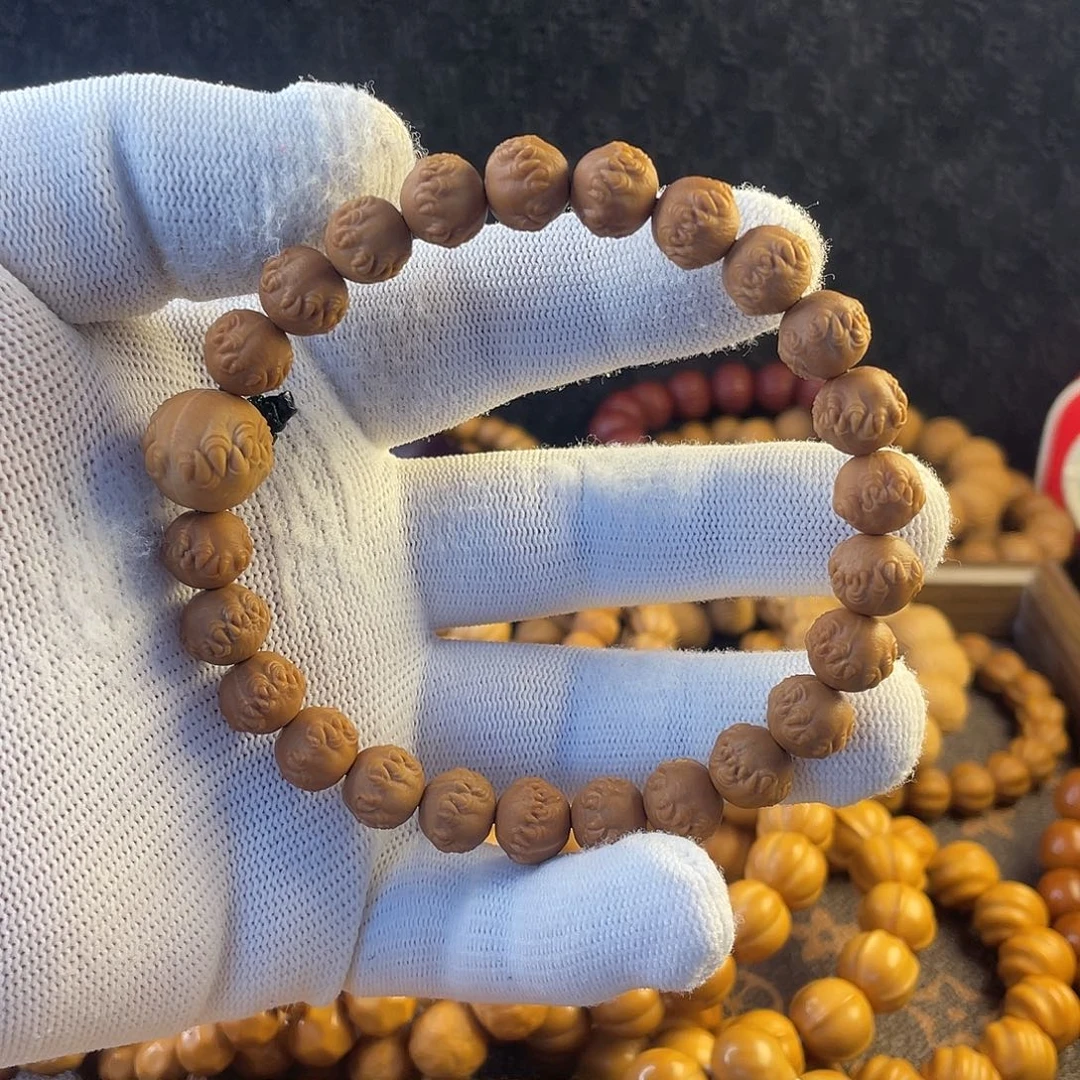 吊坠猴头核桃小吞噬手持