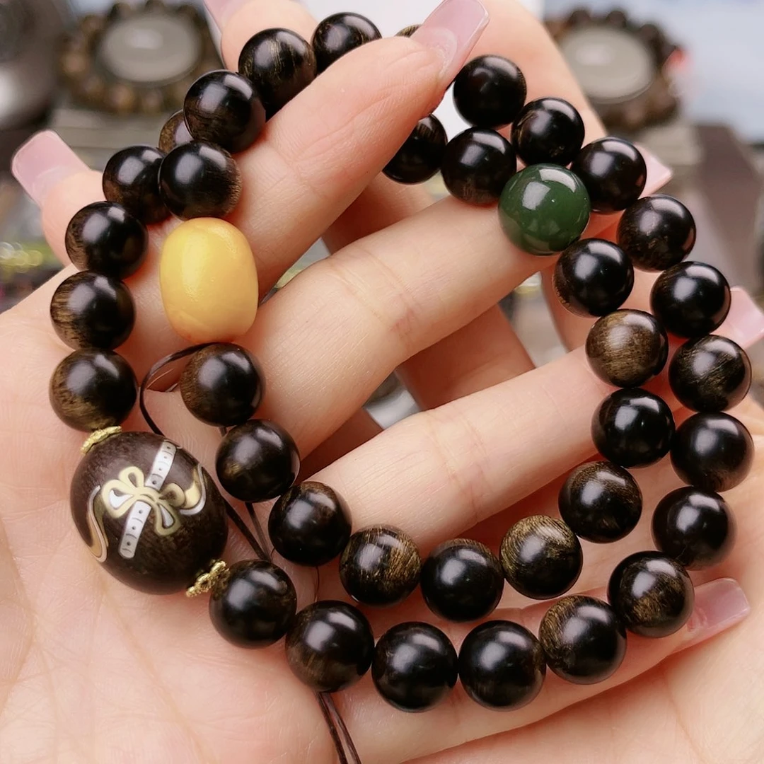 沉香手串九*越南帝王紫棋玉化古董窖藏樱子瘤疤1.0