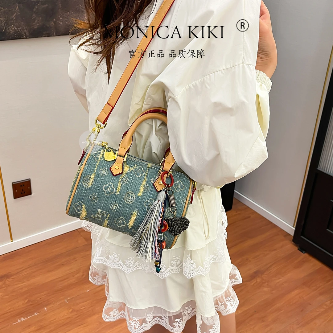 2025新款牛仔破洞女士波士顿枕头包时尚百搭手提斜挎包质感复古